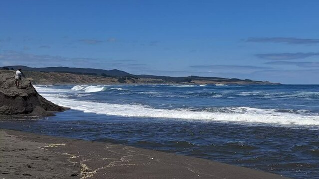 Cahuil beach with foamy waves