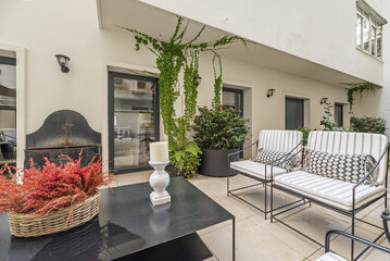 Use terraces with tables and chairs to create a perfect space for hosting outdoor events or gatherings