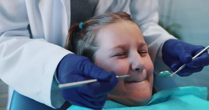 Exam, girl and fear in clinic, tools and dental scaler to check for gum disease in cavity and healthcare. Gloves, kid and scared of pain with medical equipment, wellness and closing mouth in office