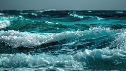 Obraz premium Beautiful close up of turquoise waves in stormy ocean