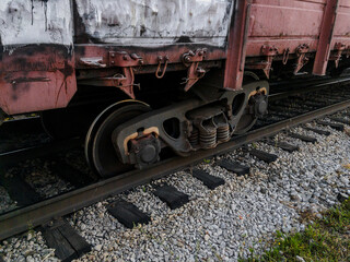 Naklejka premium As a result of a train accident, the train derailed. An accident on the railway. A railway carriage derailed during daylight hours. The wreck of railway wagons. 