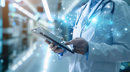 Doctors in the context of medical network connectivity technology, the concept of a digital future and hospital data systems hold small tablets