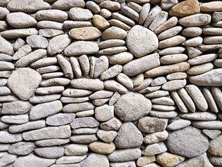 Stone mosaic wall with irregular pattern horizontal background texture