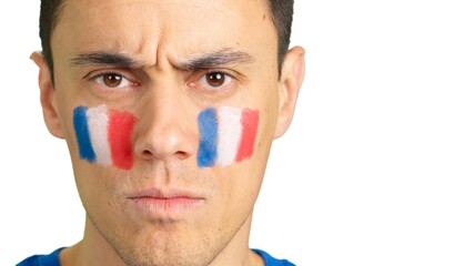 Serious man with a french flag painted on the face