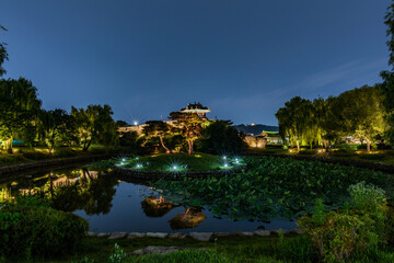 Night view of Hwaseong Fortress, Traditional Architecture of Korea in Suwon, South Korea	

