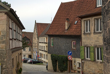 Kronach, Germany-April 10,2024:Typical cityscape view of street with ancient houses under red tile in the old town of Kronach. Architecture in Bavaria, region Upper Franconia, Germany
