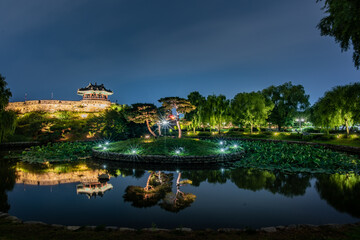 Night view of Hwaseong Fortress, Traditional Architecture of Korea in Suwon, South Korea	
