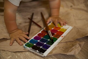 sister and brother hugging