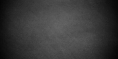 	
Abstract black stone wall texture grunge rock surface. dark gray background backdrop. wide panoramic banner. old wall stone for dark black distressed grunge background wallpaper rough concrete wall.