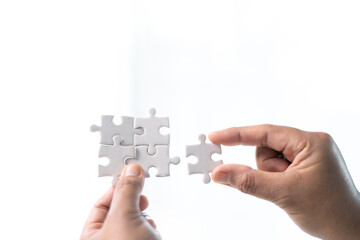 Developing strategic approach to each challenge in business is like piecing together jigsaw puzzle, solution fits into place with careful planning and steady hand, ultimately leading to success.