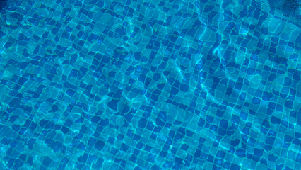 Swimming Pool Surface With Light Reflection and Water Ripple Patterns