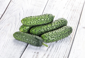 Fresh natural organic cucumbers heap
