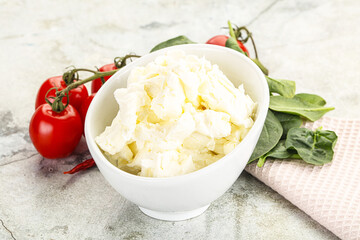 Soft cream cheese in the bowl