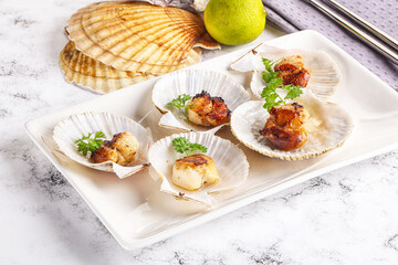 Grilled scallops shell with butter