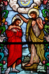 Fototapeta premium Baptism of Jesus by John the Baptist in the Jordan river. Baptême de Jésus par Jean le Baptiste dans l'eau du Jourdain.