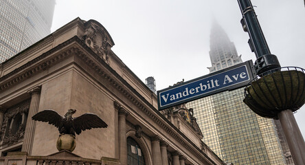 New york city signs and buildings in fog