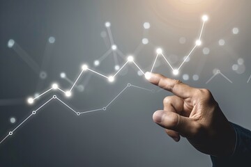 Hand touching a rising graph with glowing points, symbolizing business growth, financial success, and positive market trends.
