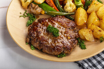 Roasted beef steak with potato