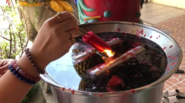 Red candle Used for worshiping Thao Wessuwan or the gods.