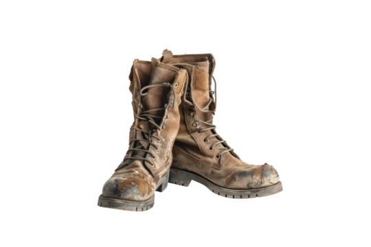 Worn leather hiking boots, rugged and broken in, symbolizing adventure and perseverance on isolated white background.
