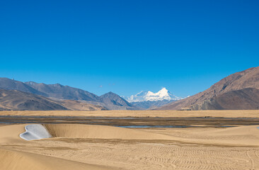 the lake, sand dune, with Brahmaputra Yarlung Zangbu River and Mt. everest and Lhotse