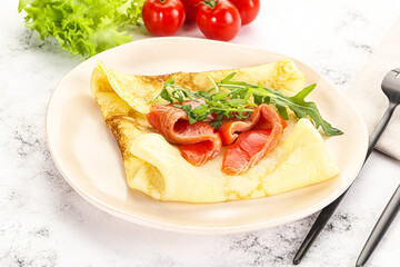 Russian pancake with salmon fish