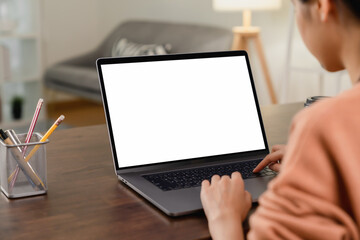 Woman hand using laptop and type on the keyboard, Mockup screen of advertisement.