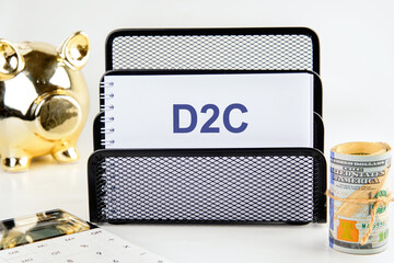 Direct to Consumer D2C.Business concepts. D2C in a notebook on a stand