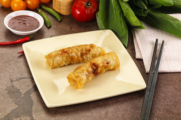 Vietnamese stuffed spring roll served sauce