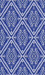 
Seamless tribal fabric pattern with blue background. Seamless tribal fabric pattern with blue and white background.