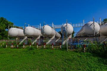 Storage tank of gas LPG in the horizontal white tank's