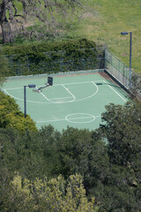 Aerial View of Basketball Court Surrounded by Trees