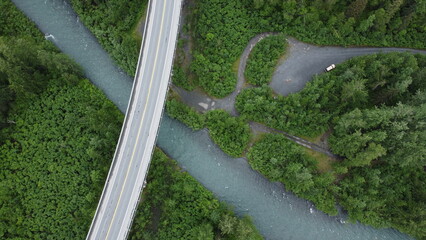 Aerial View of Alaskan Road, River, and Forest