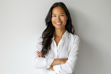 Smiling young professional business woman wearing business smart casual clothes posing isolated on white wall background with copy space