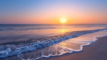 Vibrant sunset over a tranquil beach with waves gently lapping the shore, sunset, serene landscapes,