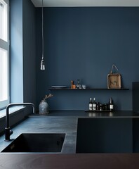 Blue wall in a minimalist kitchen with clean lines