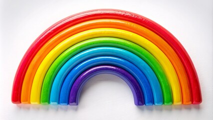 Fototapeta premium Vibrant acrylic rainbow on a pristine white background, perfect for Children's Day design, banner, and presentation, evoking joy and innocence.