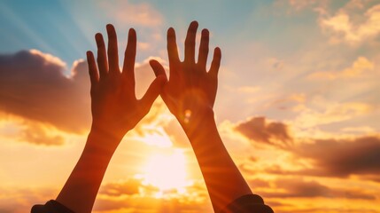 Hands Reaching for Hope and Support in Sunset Silhouette