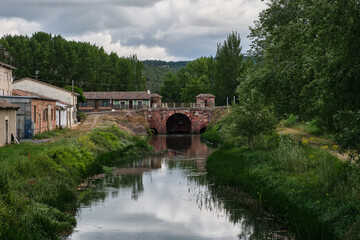 Lock and bridge of the Canal de Castilla located in the Spanish municipality of Alar del Rey. Civil and hydraulic engineering work in the 18th and 19th centuries