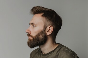 Obraz premium Haircut Adult. Portrait of a Satisfied Male Spouse with Trendy Haircut for Advertisement