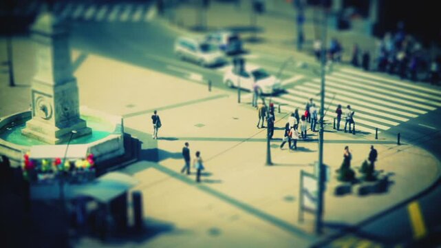 Beautifully graded tilt shift footage of city rush hour