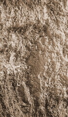 A mountainous sandy surface. Natural reddish texture