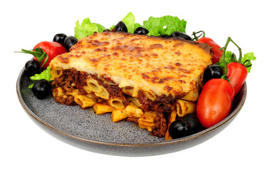 Pastitsio pasta meal with fresh salad and black olives