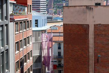 Worker on a scaffolding