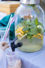 lemonade with mint leaves in glass jar