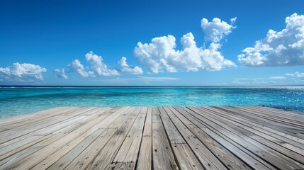 Fototapeta premium Wooden floor with blue sky and white clouds as background and clear sea with sunlight shining on it. Colorful colors.