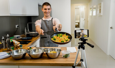 The chef is broadcasting live from workshop how to prepare a vegetarian food