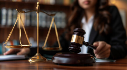 closeup, female lawyer is sitting at her desk, 