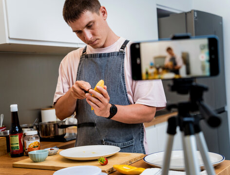 The chef is broadcasting live from workshop how to prepare a vegetarian food