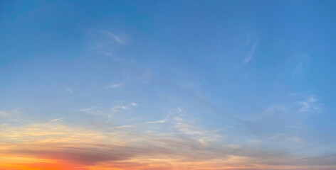Blue sunrise sky with gold and red sunlight. Skym sun and cloud, outdoors weather background